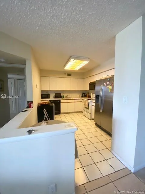 3530 Mystic Pointe Dr # 411, Aventura FL 33180
