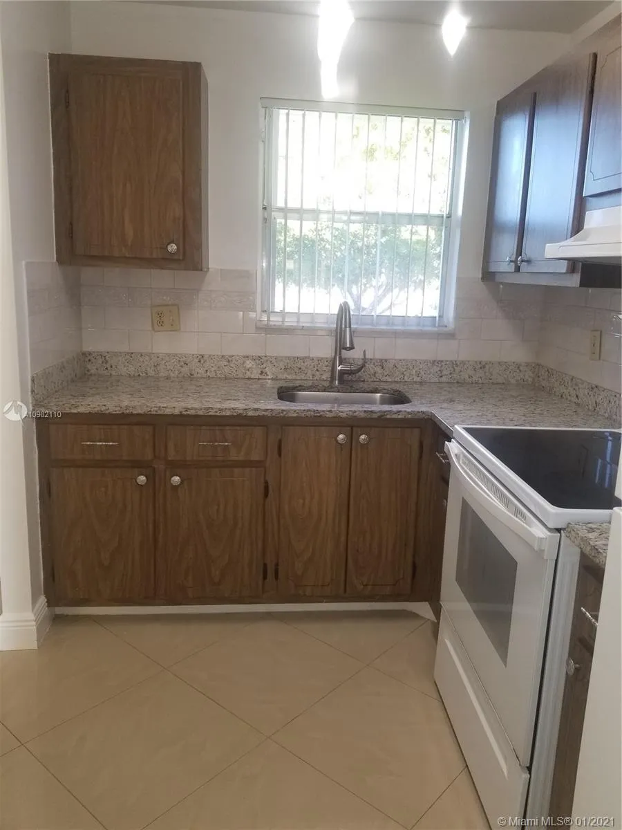 8450 Sunrise Lakes Blvd # 202, Sunrise FL 33322