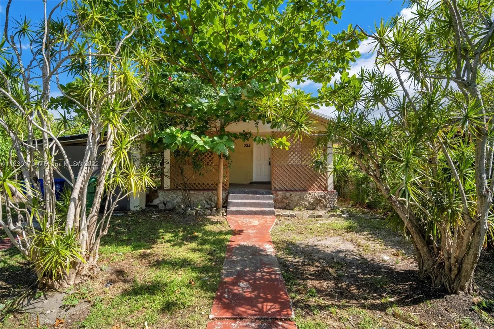 4 bedroom 3 bath for sale at 322 NW 41st St, Miami FL 33127