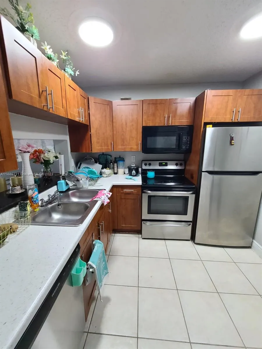 496 NW 165th St Rd # D112, Miami FL 33169