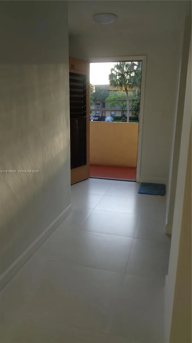6085 N Sabal Palm Blvd # 204, Tamarac FL 33319
