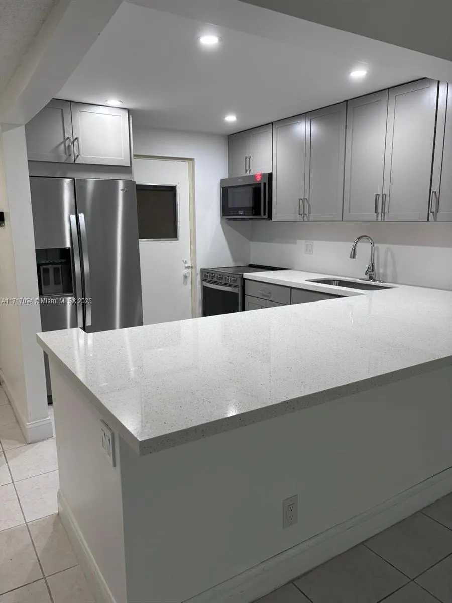 2 bedroom 2 bath for sale at 2309 S Cypress Bend Dr # 115B, Pompano Beach FL 33069