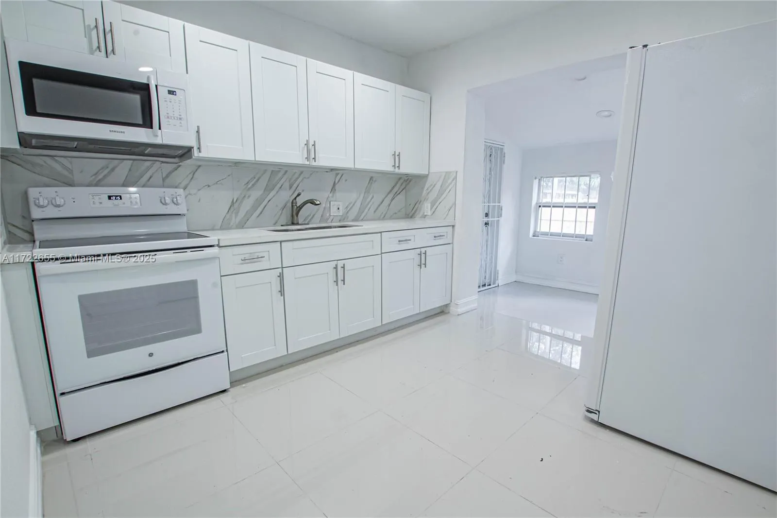 3 bedroom 2 bath for sale at 575 NW 49th St, Miami FL 33127