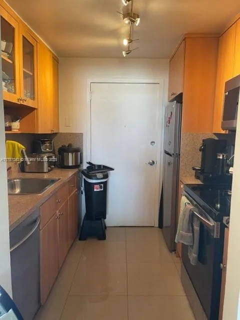 2020 NE 135th St # 303, North Miami FL 33181