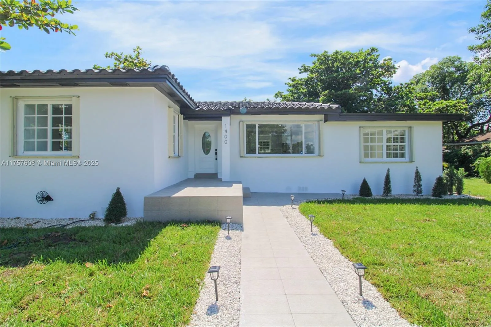 3 bedroom 2 bath for sale at 1400 NW 57th St, Miami FL 33142