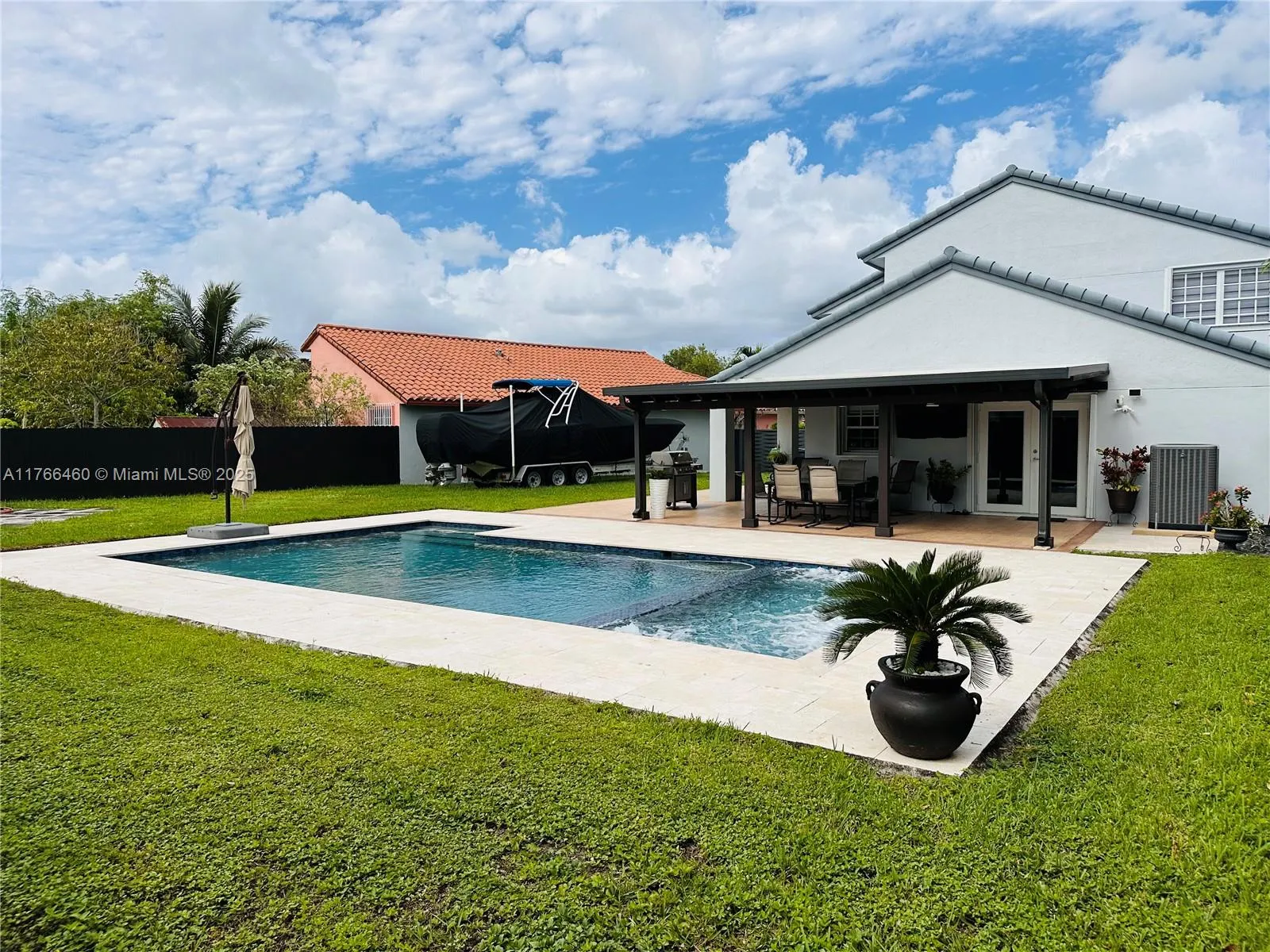 4 bedroom 3 bath for sale at 14820 SW 63rd St, Miami FL 33193