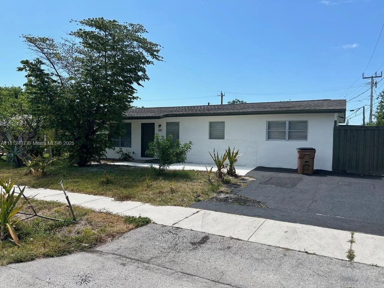 4 bedroom 2 bath for sale at 880 NE 49th St, Deerfield Beach FL 33064
