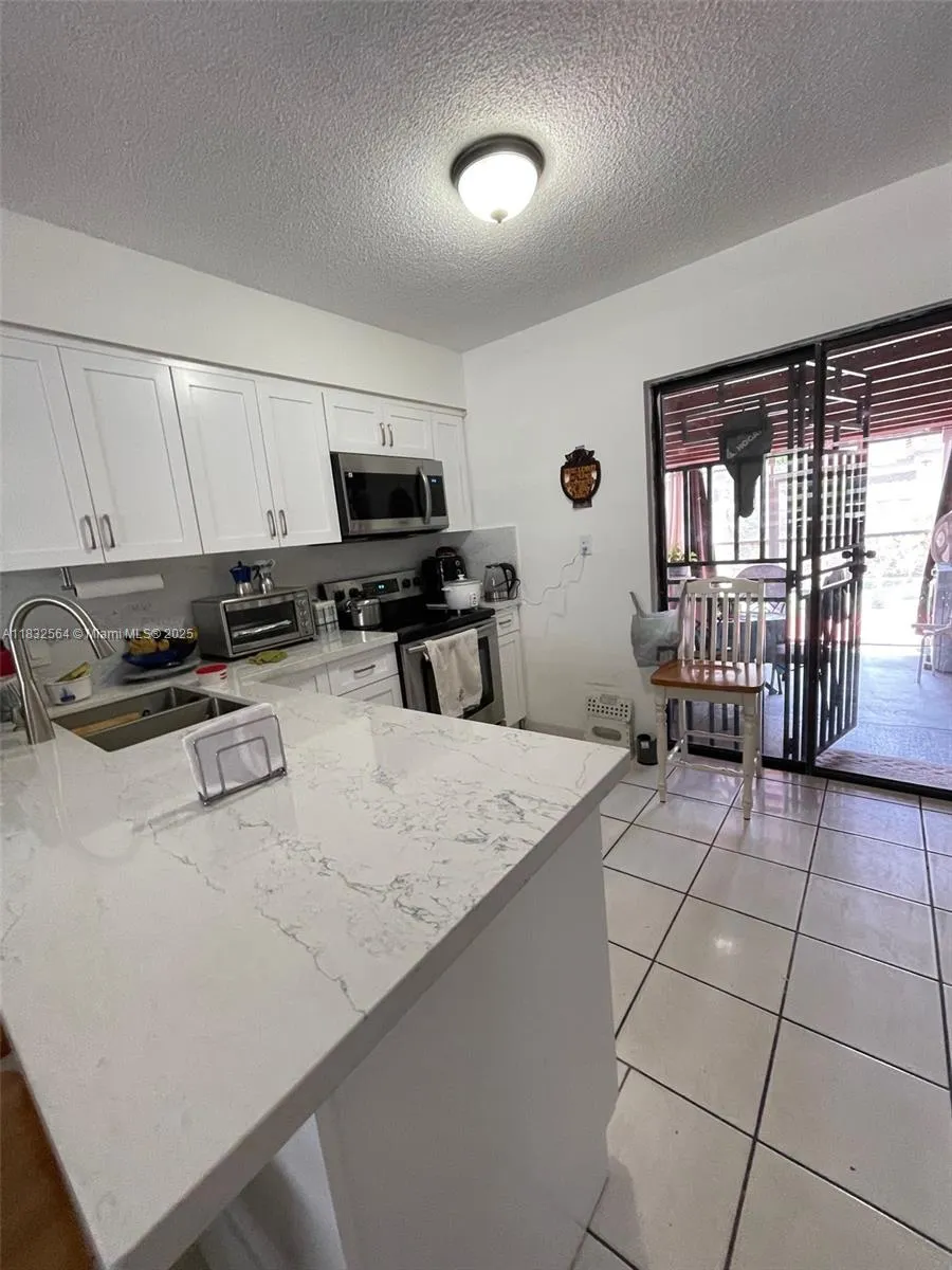 12057 SW 10th St # 202, Miami FL 33184