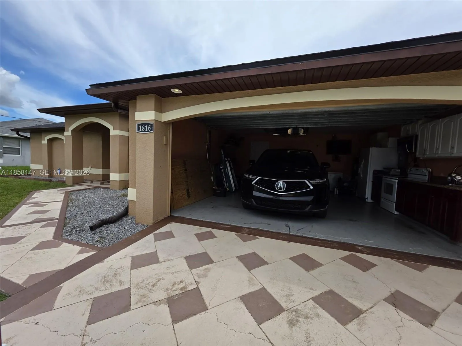 1816 Tomaso Ave, Lehigh Acres FL 33972