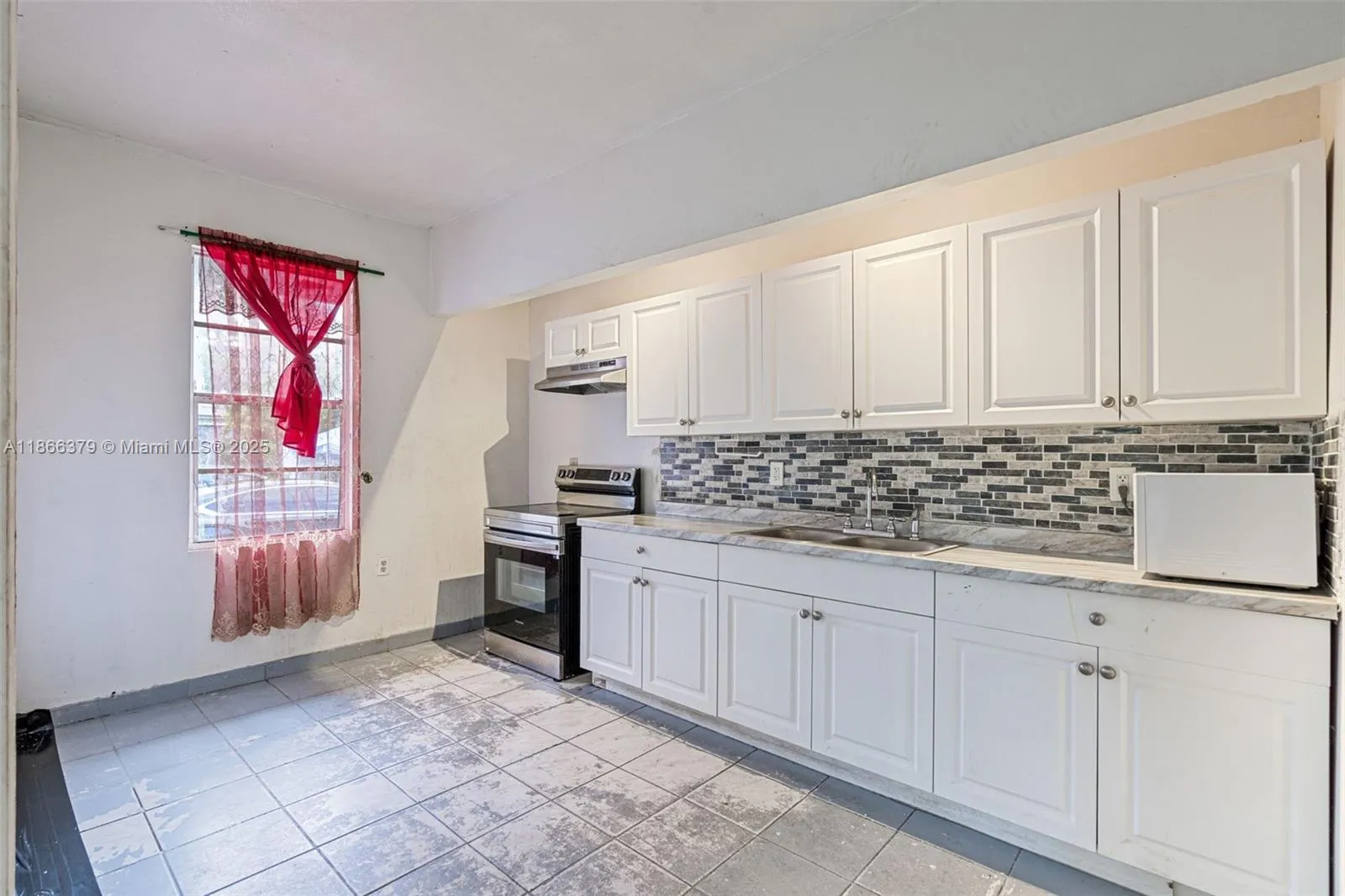 71 NW 34th Ter, Miami FL 33127