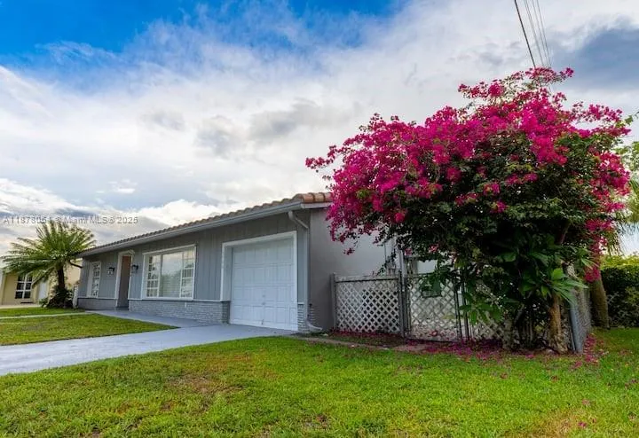 4 bedroom 3 bath for sale at 6466 NW 20th St, Margate FL 33063