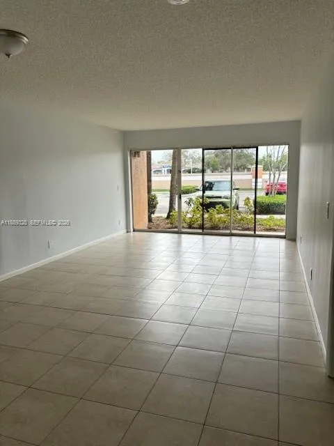 8977 Wiles Rd # 103, Coral Springs FL 33067