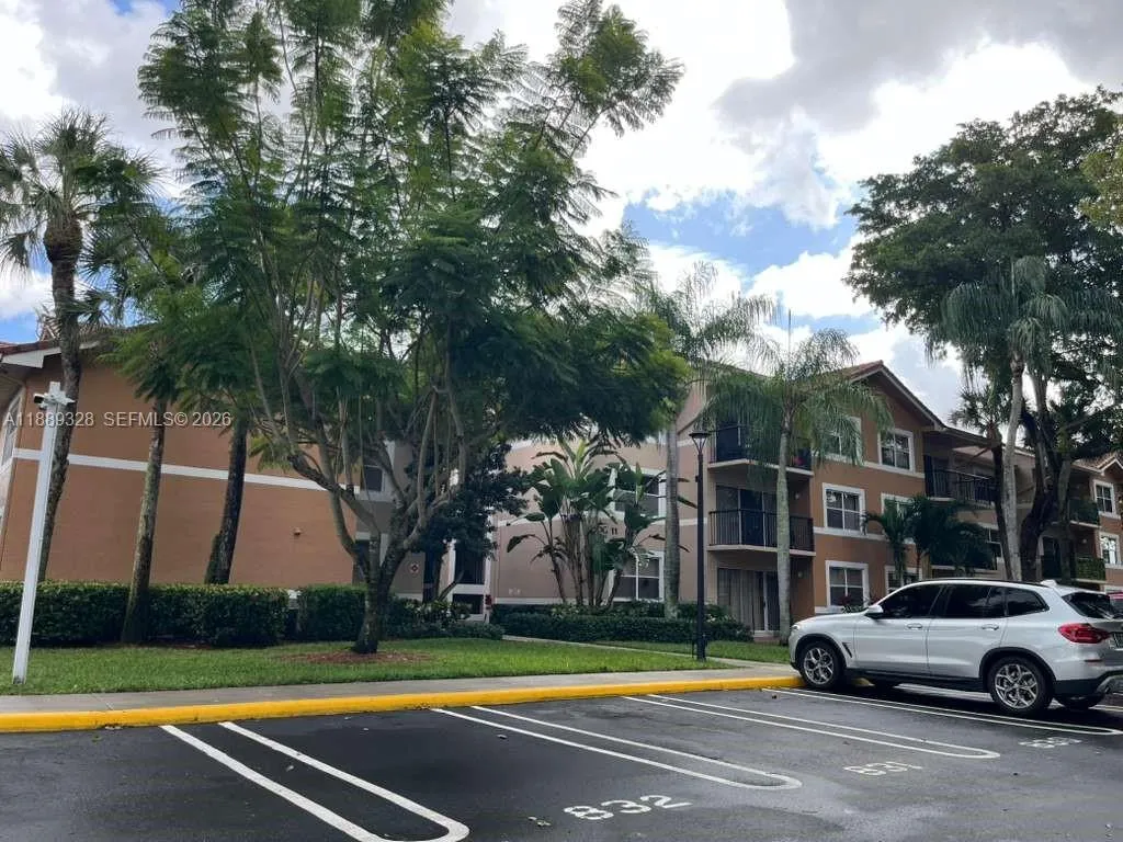 8977 Wiles Rd # 103, Coral Springs FL 33067