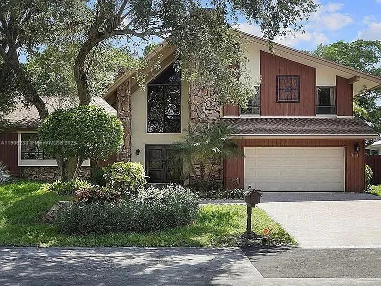 4 bedroom 2 bath for sale at 863 W Coco Plum Cir, Plantation FL 33324