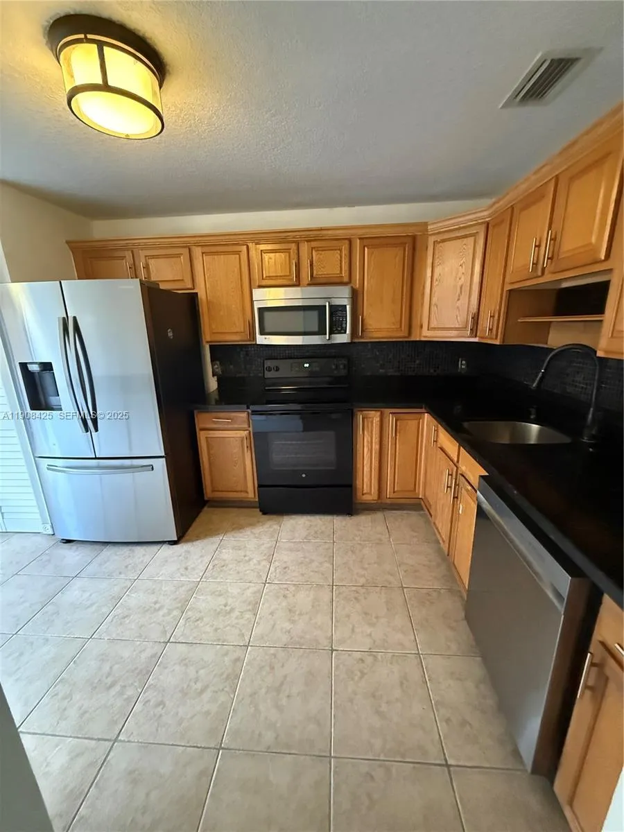 3 bedroom 2 bath for sale at 9986 Royal Palm Blvd # 9986, Coral Springs FL 33065