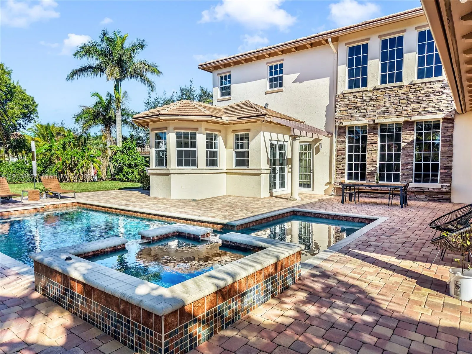 6 bedroom 5 bath for sale at 12008 NW 69th Ct, Parkland FL 33076