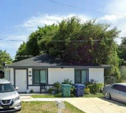 4 bedroom 2 bath for sale at 2130 NW 46th St, Miami FL 33142