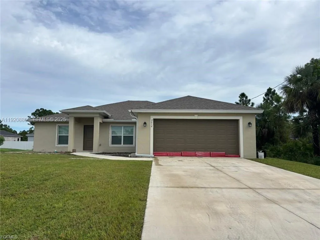 4 bedroom 3 bath for sale at 2614 27th ST W, Lehigh Acres FL 33971