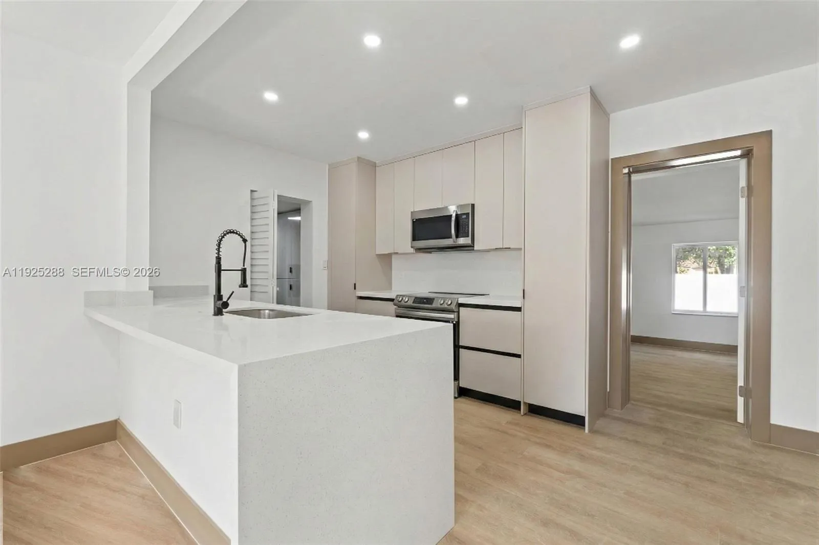 4 bedroom 3 bath for sale at 1453 NW 56th St, Miami FL 33142