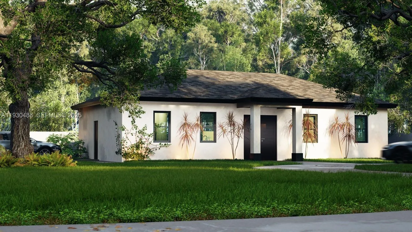 4 bedroom 3 bath for sale at 911 Ardmore St, Lehigh Acres FL 33974