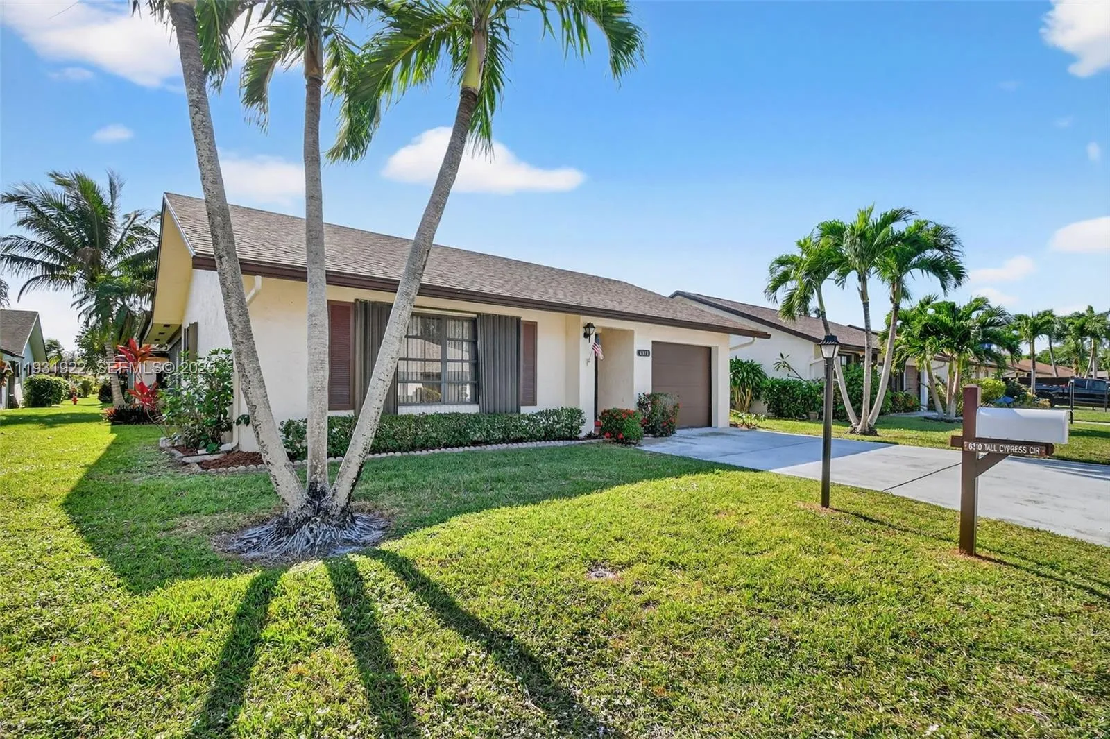 6310 Tall Cypress Cir, Green Acres FL 33463