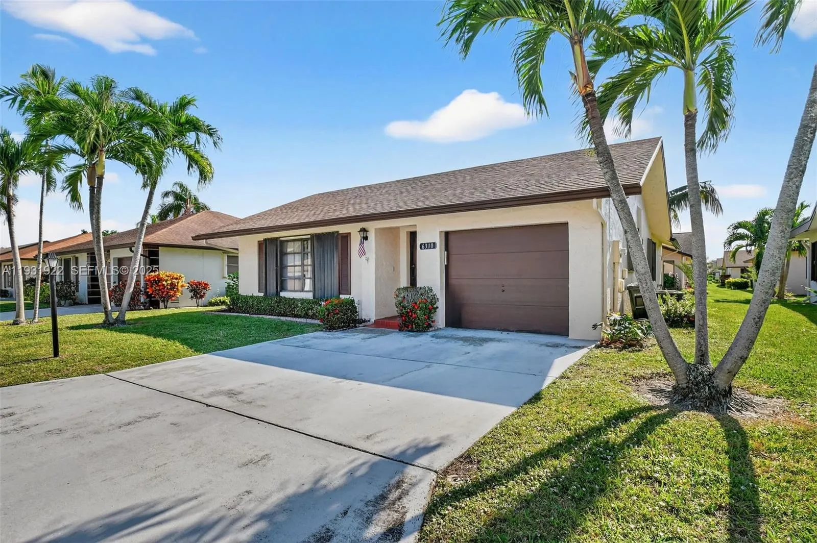 6310 Tall Cypress Cir, Green Acres FL 33463