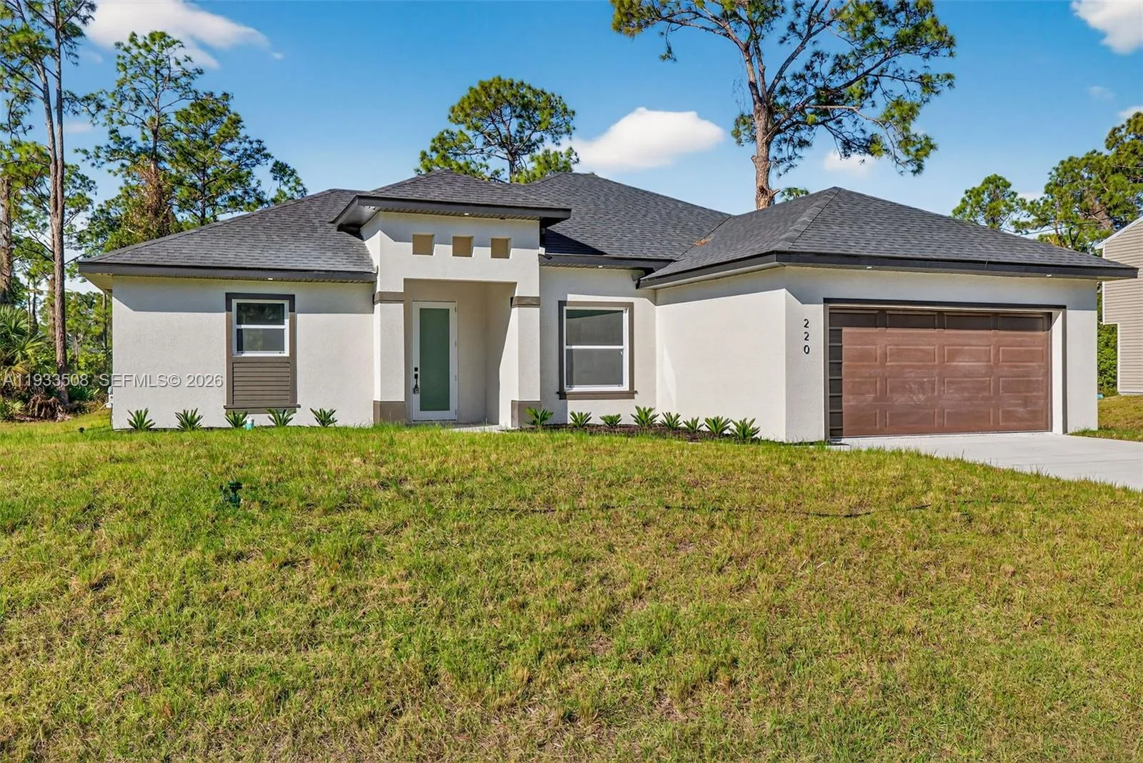 4 bedroom 2 bath for sale at 220 Lomax Ave, Lehigh Acres FL 33974