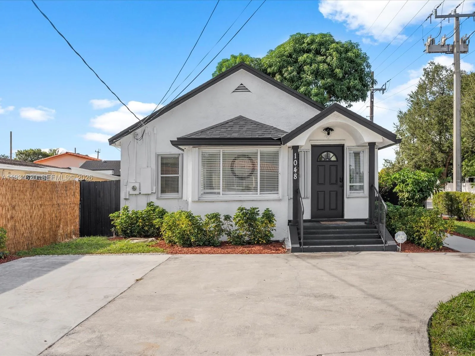 4 bedroom 3 bath for sale at 1048 NW 33rd Ave, Miami FL 33125