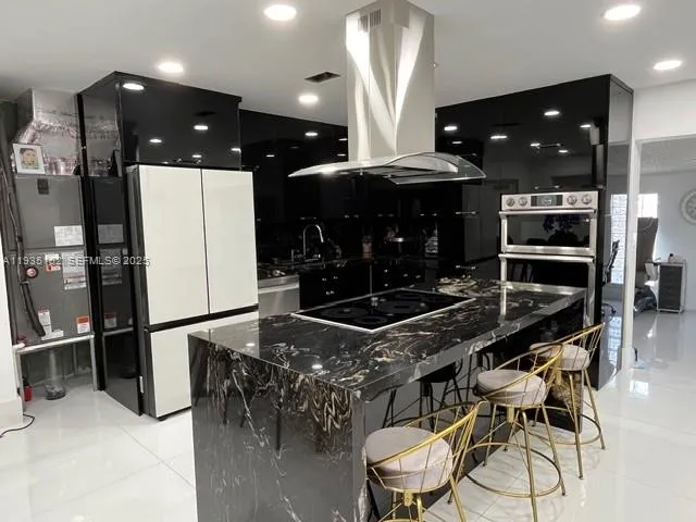 4 bedroom 3 bath for sale at 6190 W 14th Ave, Hialeah FL 33012