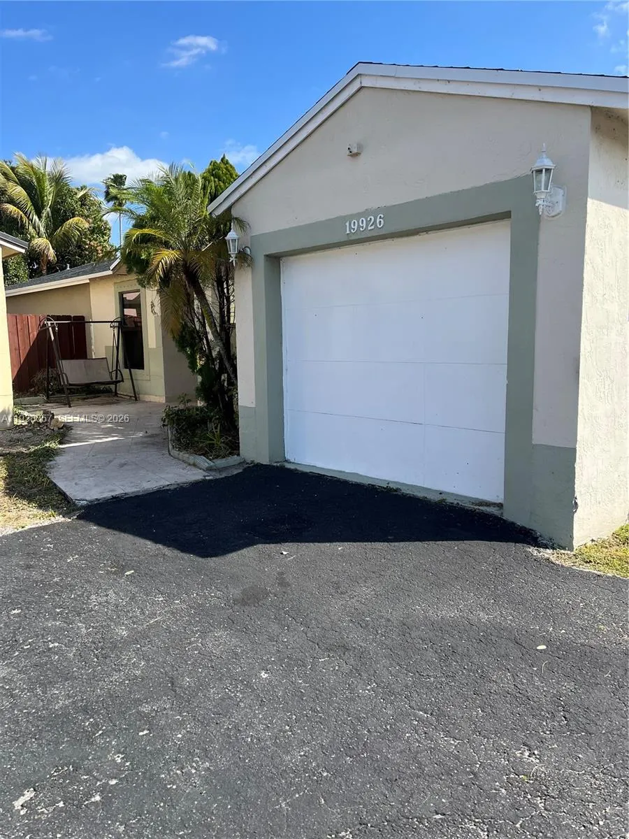 4 bedroom 2 bath for sale at 19926 NW 67th Pl, Hialeah FL 33015