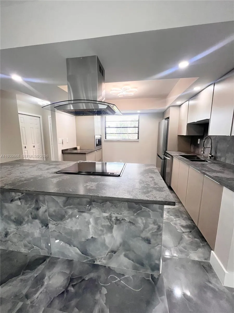 4930 E Sabal Palm Blvd # 206, Tamarac FL 33319