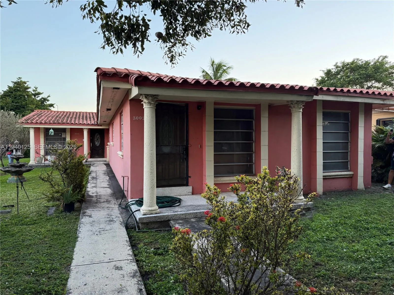 5 bedroom 3 bath for sale at 3000 NW 13th St, Miami FL 33125