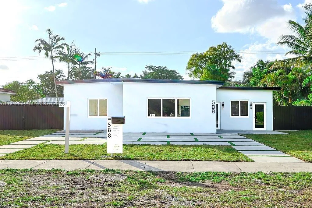 5 bedroom 4 bath for sale at 588 Palmetto Dr, Miami Springs FL 33166