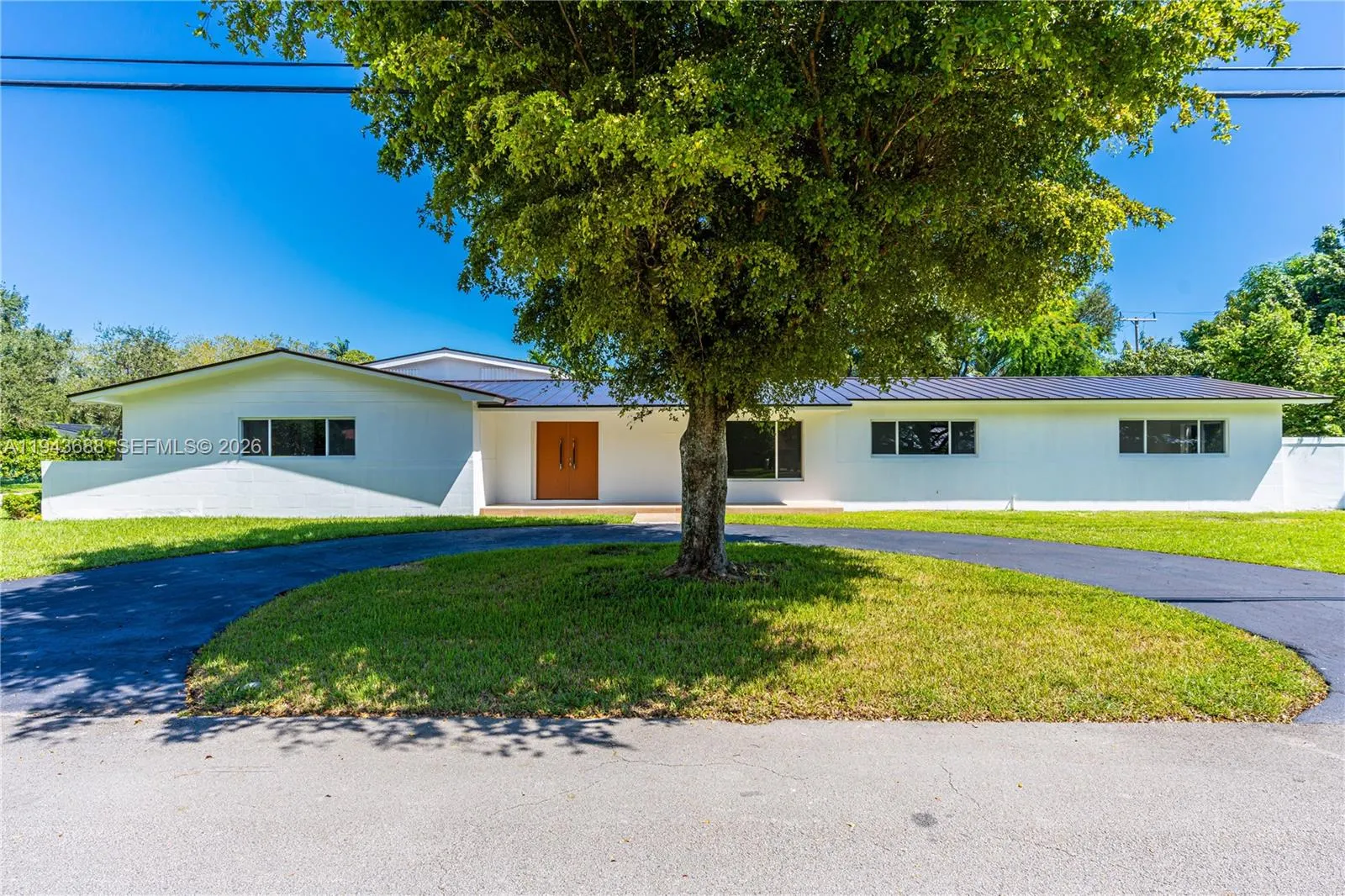 5 bedroom 4 bath for sale at 12525 SW 68th Ct, Pinecrest FL 33156