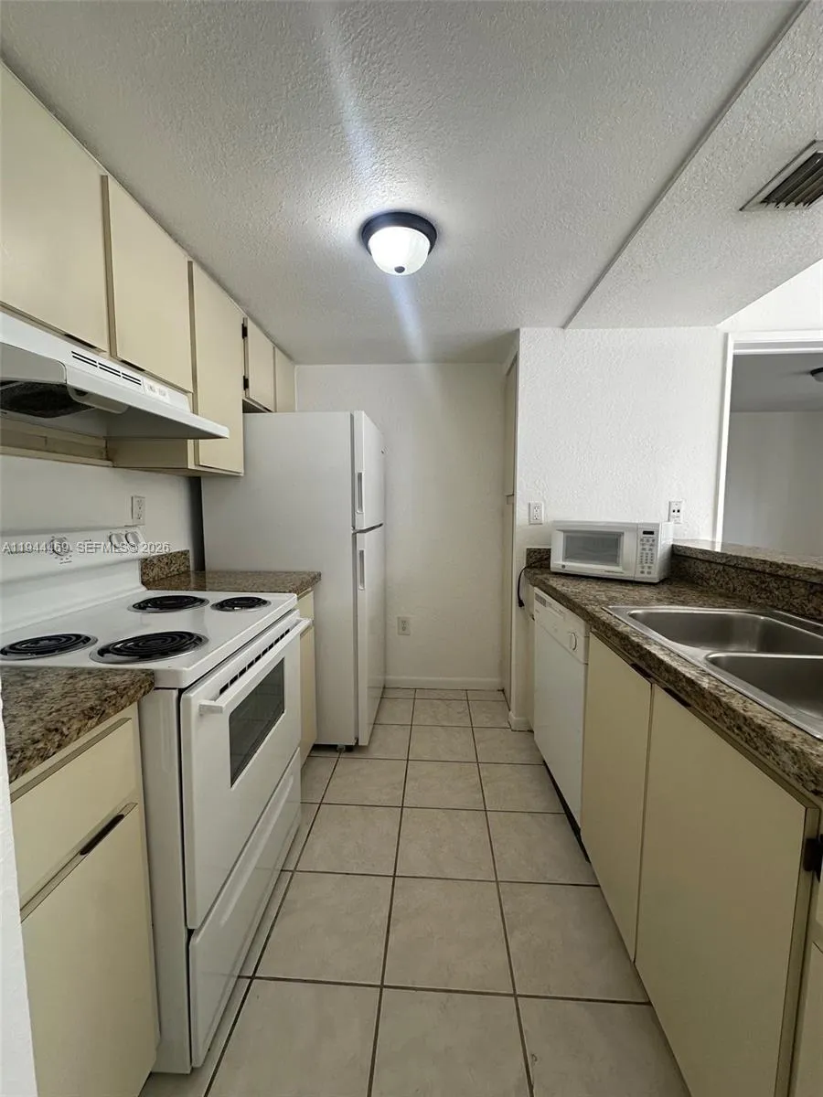 2 bedroom 2 bath for sale at 7125 NW 186th St # B208, Hialeah FL 33015