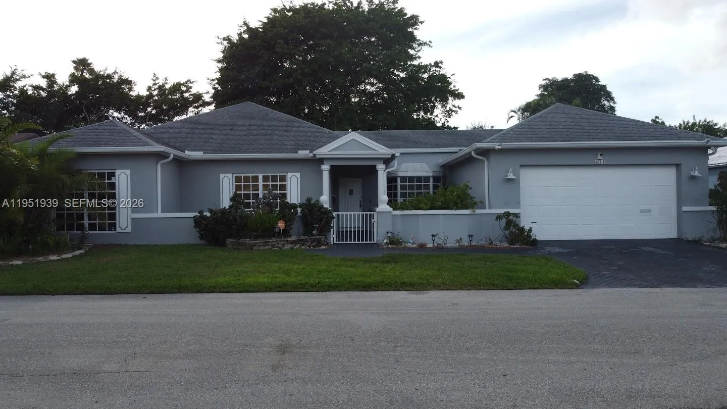 3 bedroom 2 bath for sale at 4511 Queen Palm Ln, Tamarac FL 33319
