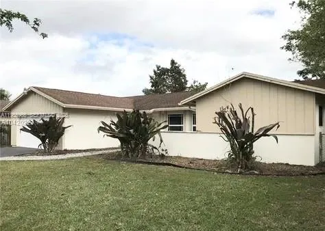 4 bedroom 2 bath for sale at 11031 SW 141st Ave, Miami FL 33186