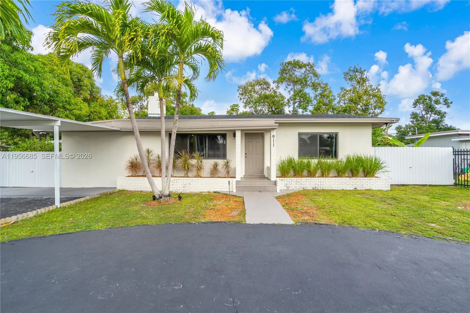 5 bedroom 4 bath for sale at 911 NW 138th St, Miami FL 33168