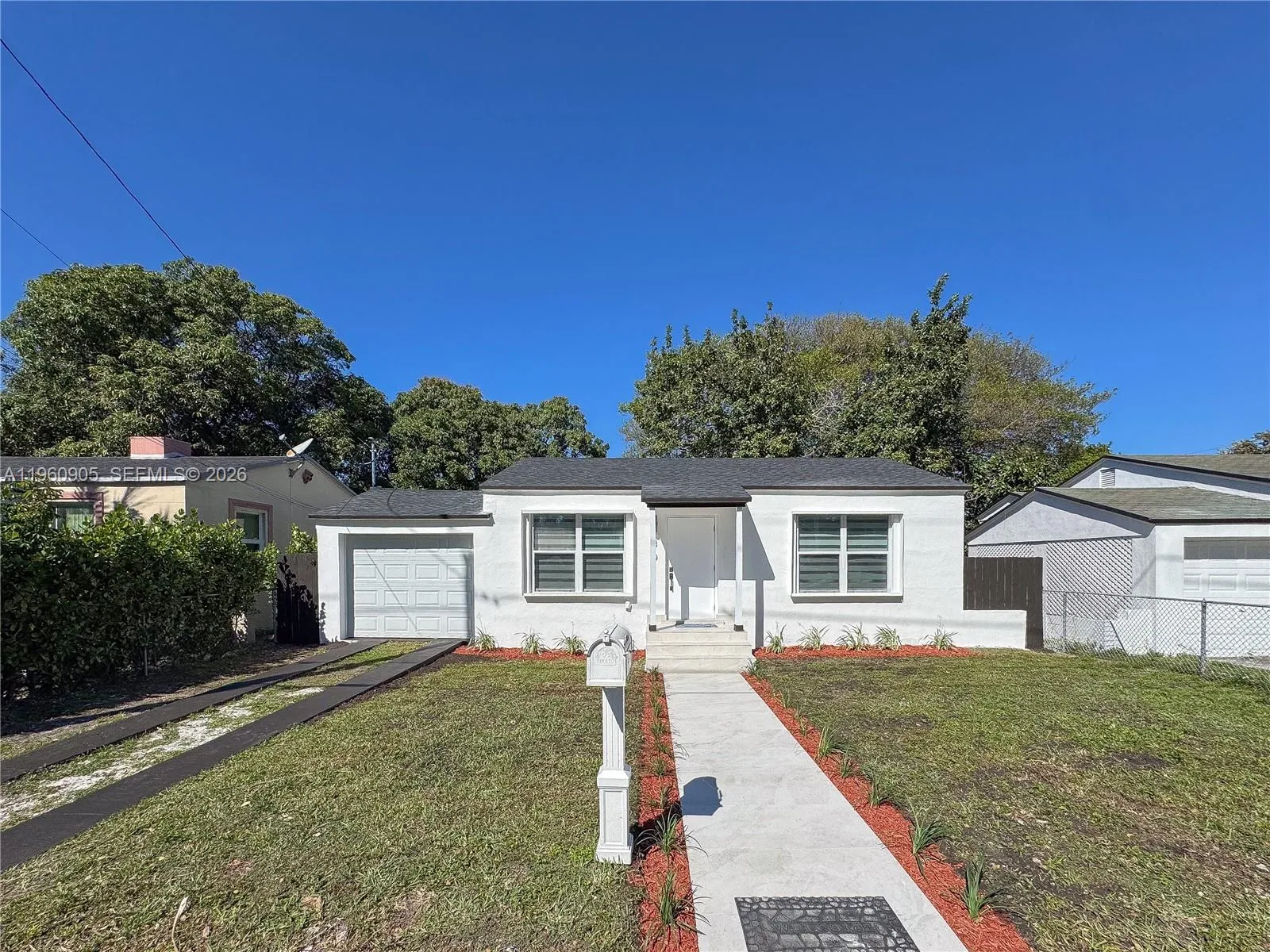 4 bedroom 3 bath for sale at 1319 NW 40th St, Miami FL 33142