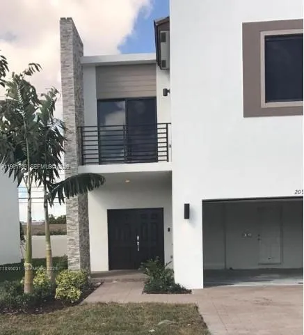 3 bedroom 3 bath for sale at 388 NE 208th Ter, Miami FL 33179