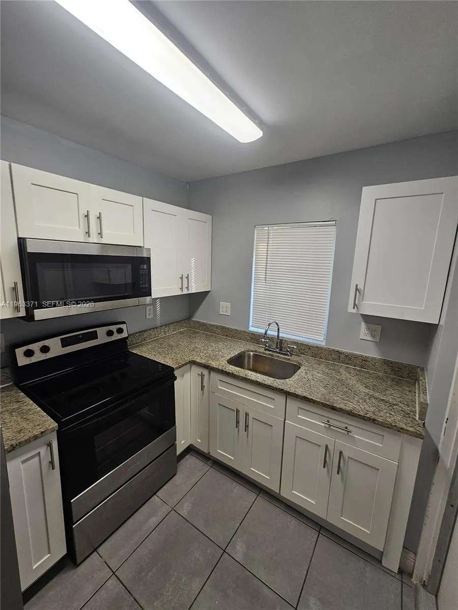 1128 NW 101st St, Miami FL 33150