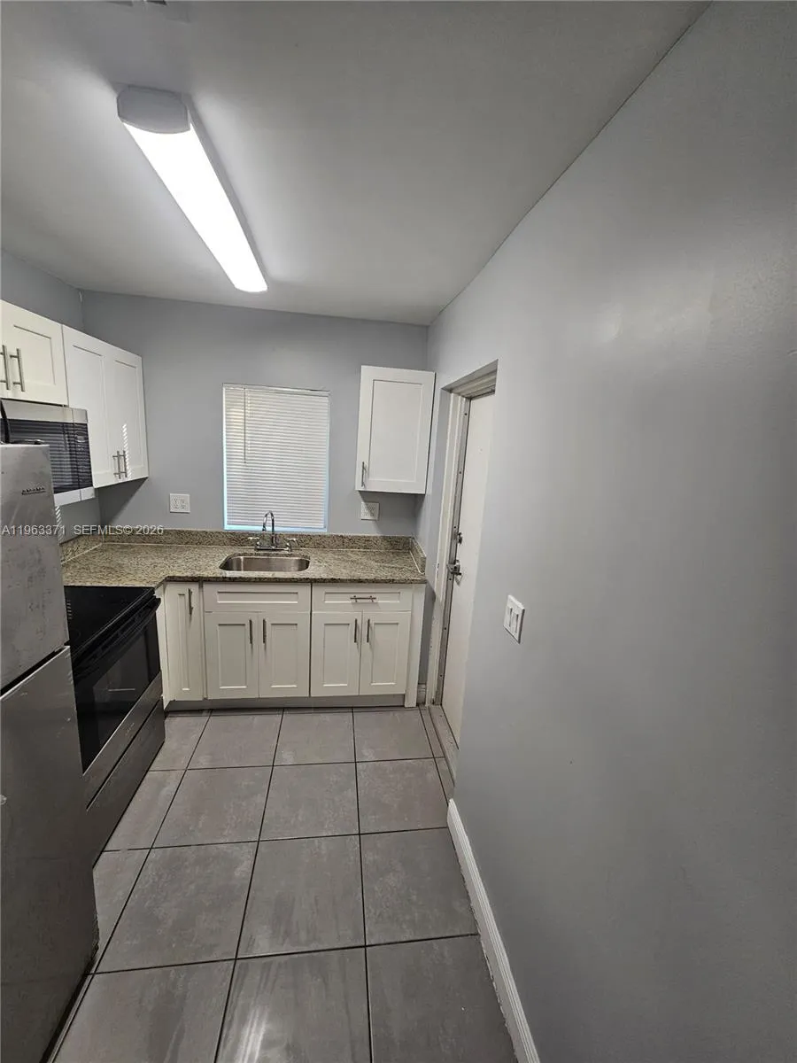 1128 NW 101st St, Miami FL 33150