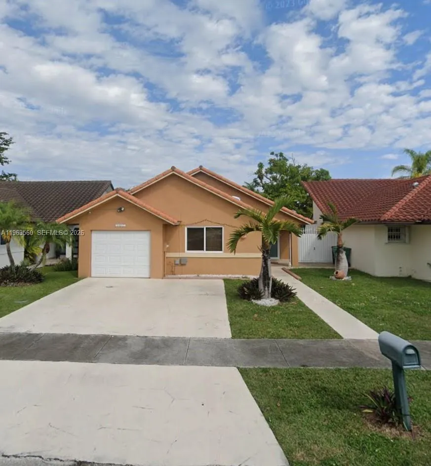 4 bedroom 2 bath for sale at 14217 SW 102nd St, Miami FL 33186