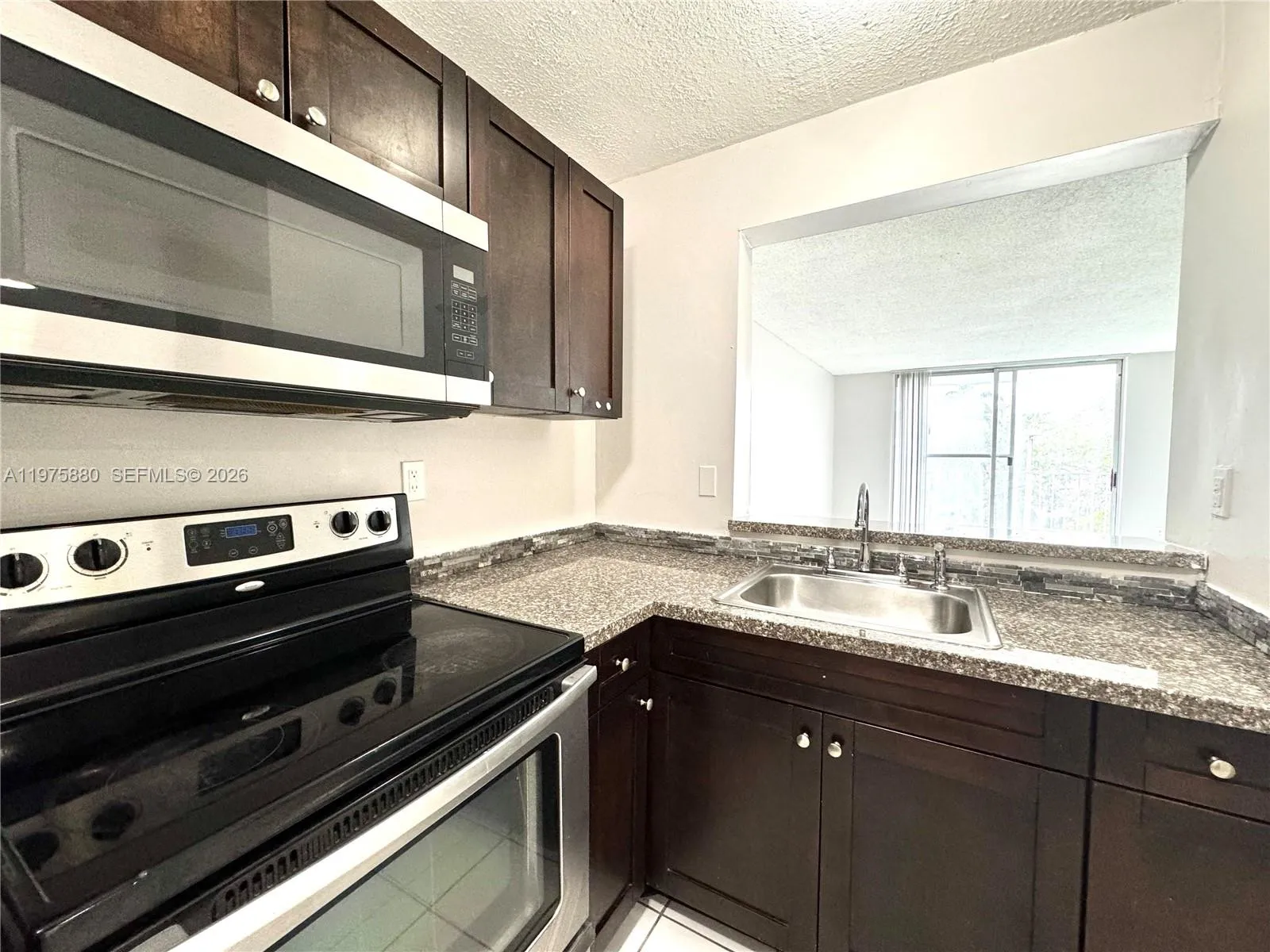 1 bedroom 1 bath for sale at 484 NW 165th St Rd # 411, Miami FL 33169