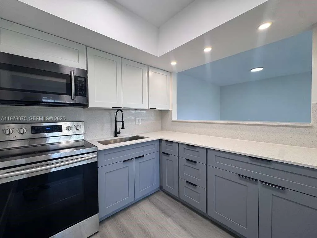 455 Golden Isles Dr # 203, Hallandale Beach FL 33009