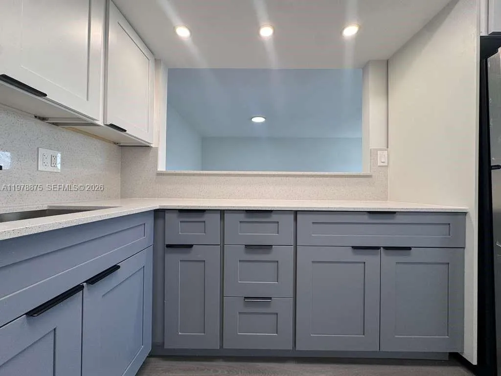 455 Golden Isles Dr # 203, Hallandale Beach FL 33009
