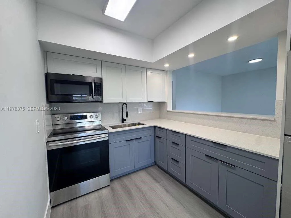 455 Golden Isles Dr # 203, Hallandale Beach FL 33009
