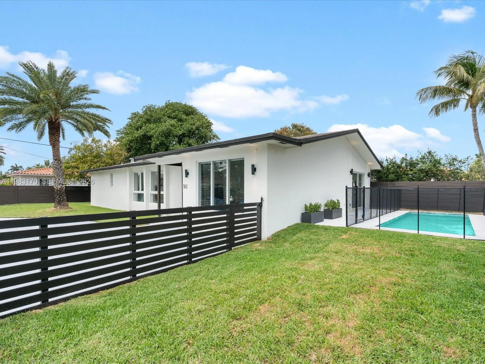 4 bedroom 3 bath for sale at 301 88th St, Surfside FL 33154