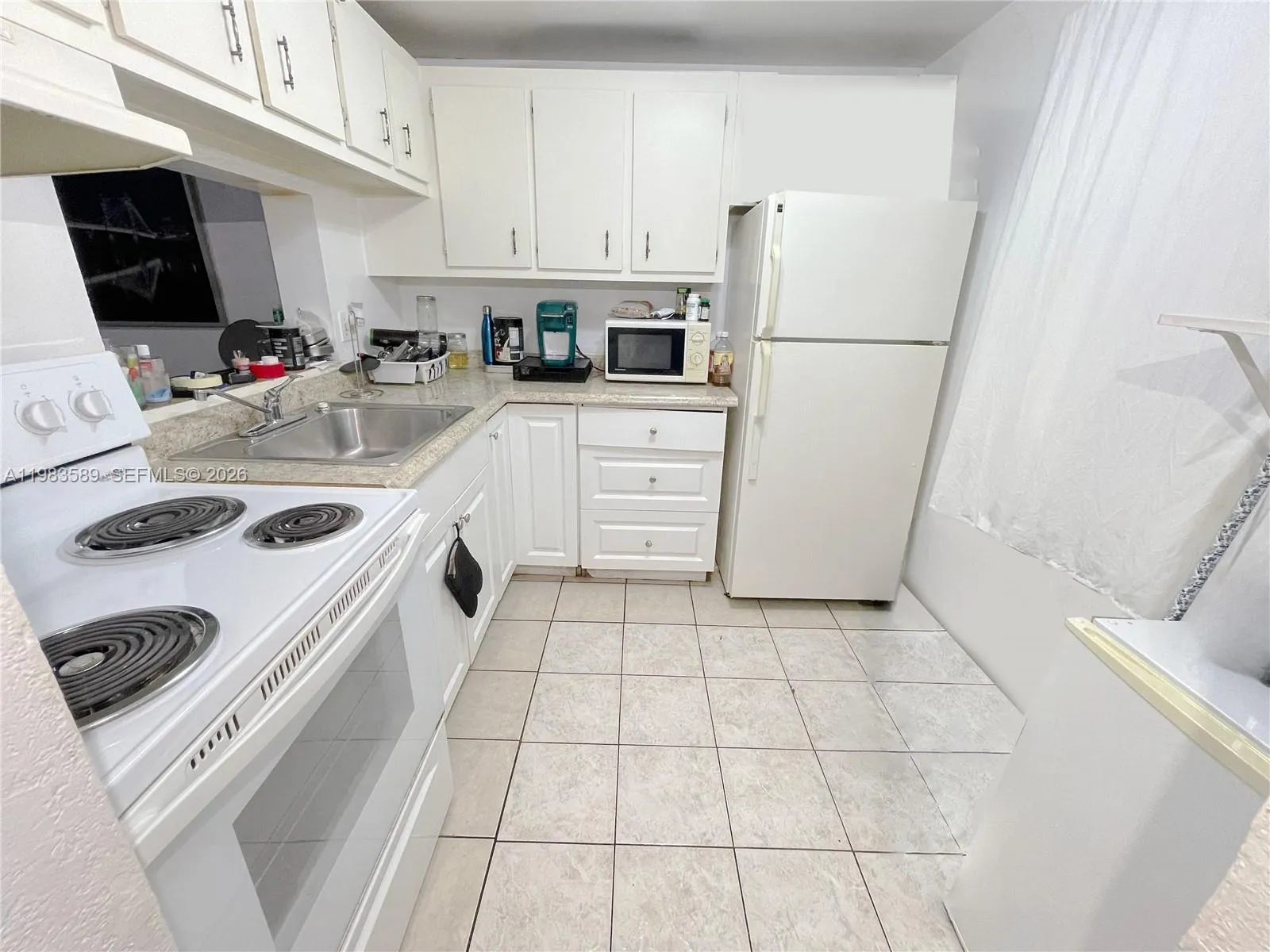 2800 NW 56th Ave # E103, Lauderhill FL 33313