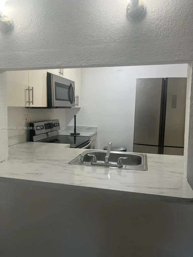 1 bedroom 1 bath for sale at 4550 NW 9th St # 114E, Miami FL 33126